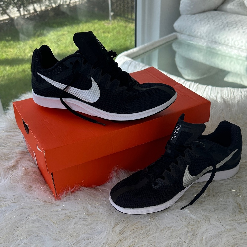 SOLD. NIKE RIVAL DISTANCE
